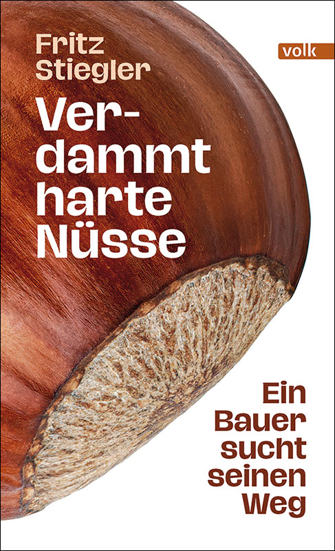 Ein weißes Buchcover, auf dem eine große Haselnuss zu sehen ist.
