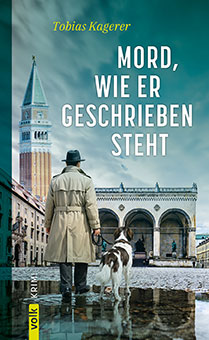 Ein Mann und sein Hund gehen auf die Feldherrnhalle zu